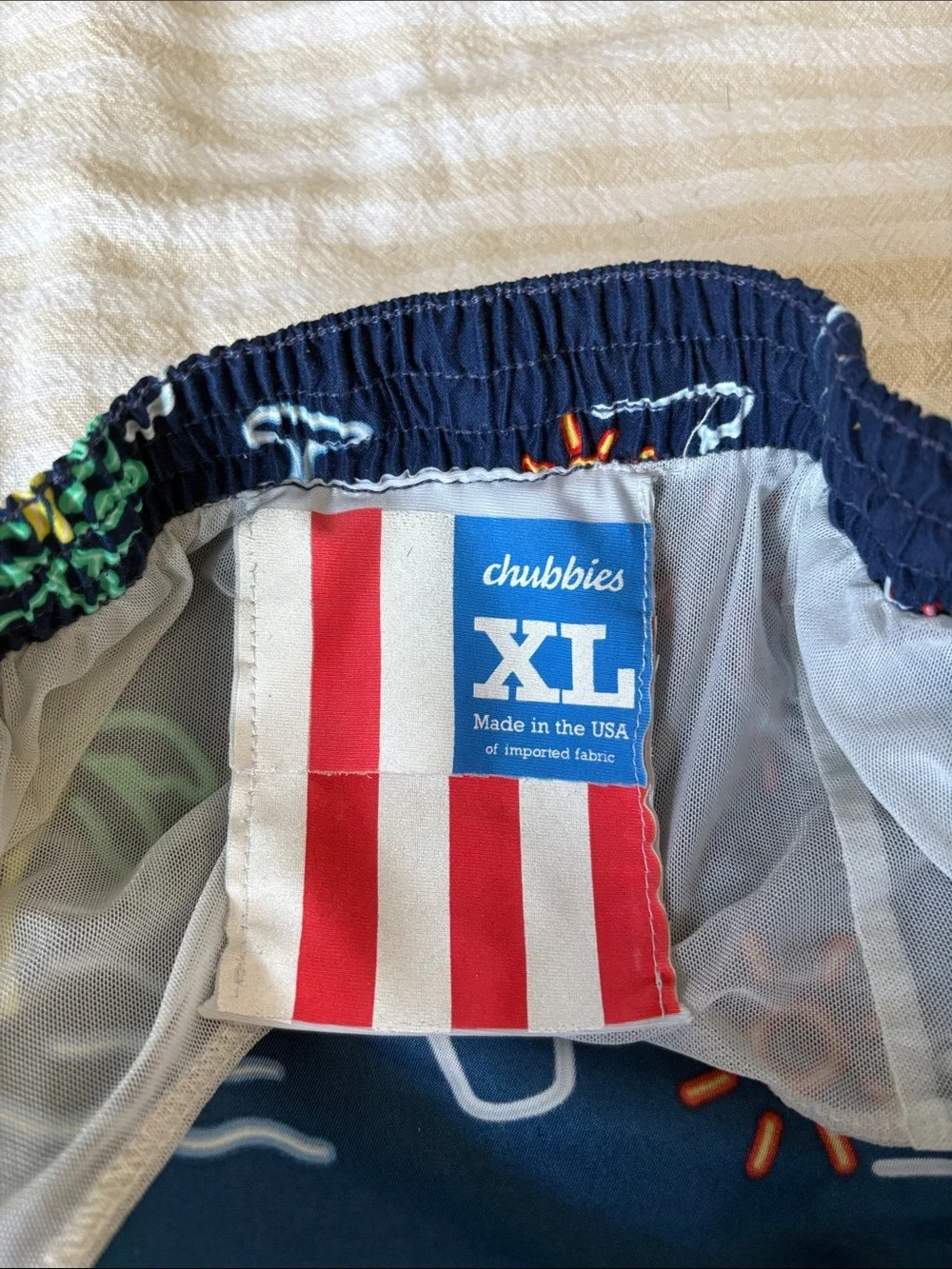 chubbies Navy Neon Tropical Print Swim Trunks